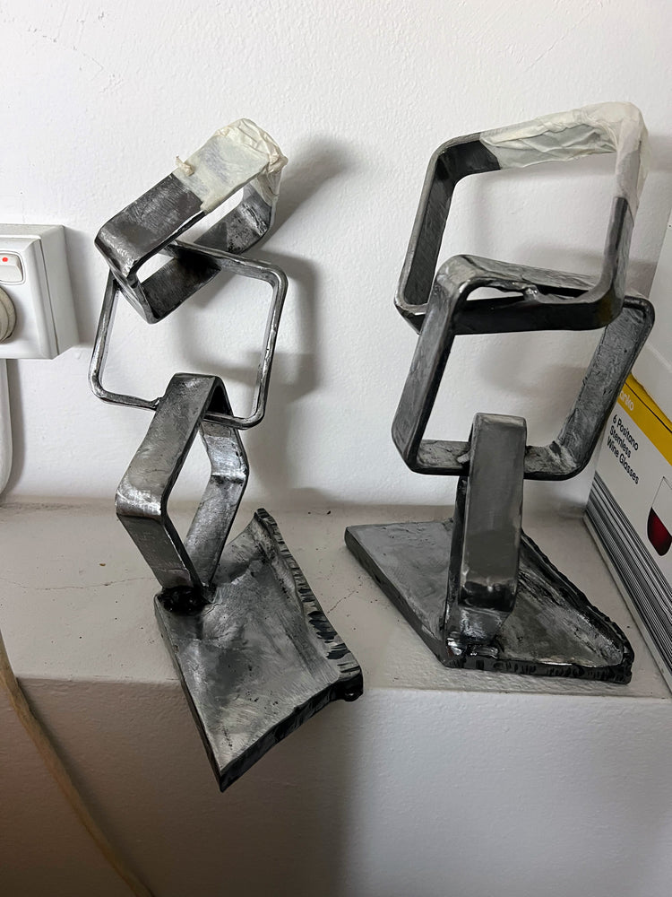 Shackled Dreams I (2 sculpture series)